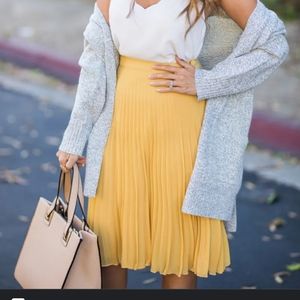Yellow pleated midi skirt